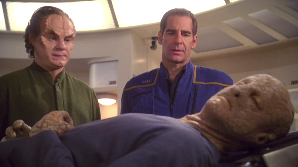Phlox and Archer with the alien in sickbay