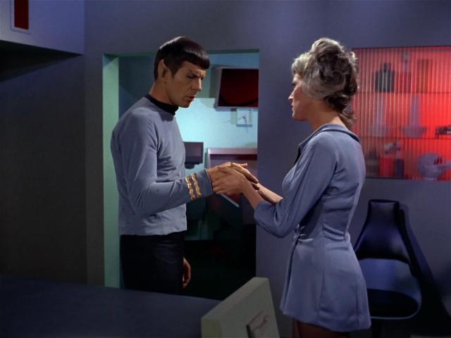 Chapel takes Spock's hand